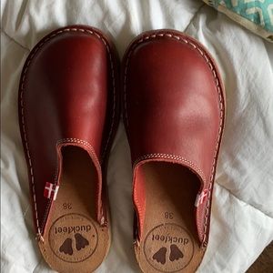 Women’s duck feet clogs.